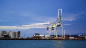 https://www.pexels.com/photo/industrial-port-with-cargo-cranes-at-twilight-34578903/