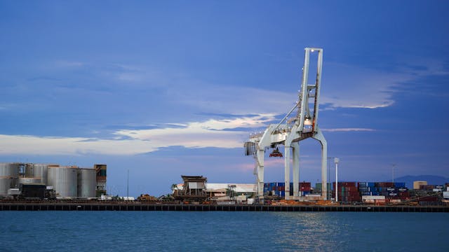 https://www.pexels.com/photo/industrial-port-with-cargo-cranes-at-twilight-34578903/