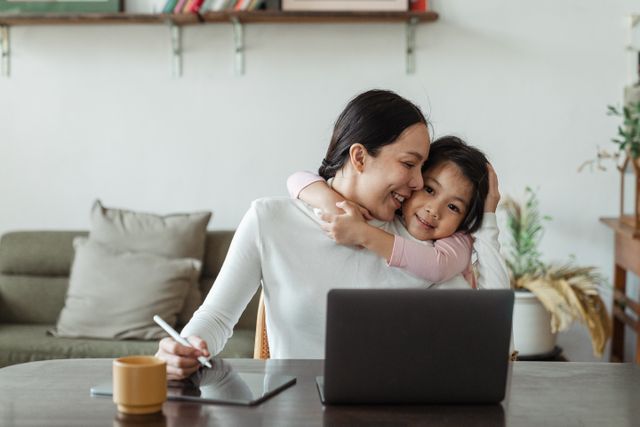 https://www.pexels.com/photo/cute-little-ethnic-girl-embracing-working-mother-4474036/